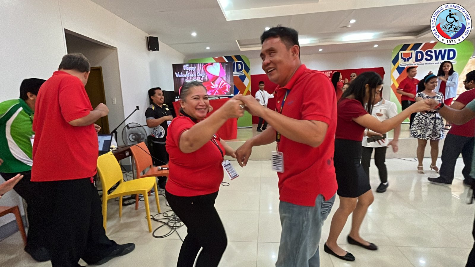 PWD clients serenade and dance with AVRC II staff with love songs.